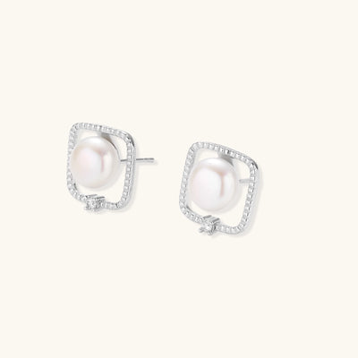 Square sterling silver stud earrings with freshwater pearls and crystal accents on white background.