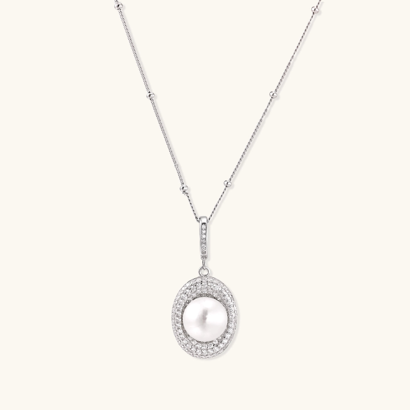 Sterling silver necklace with freshwater pearl in sparkling crystal halo pendant on delicate beaded chain