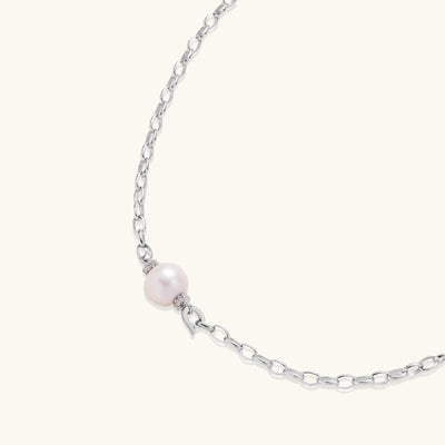 Sterling silver chain necklace with single white freshwater pearl centerpiece on neutral background, 445mm length.