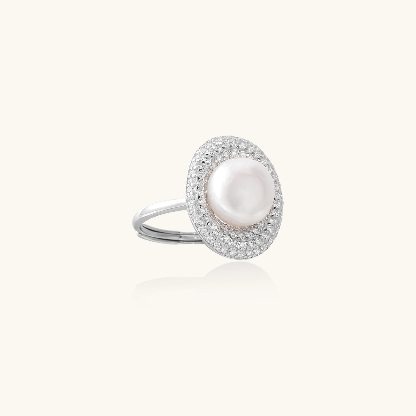 Sterling silver ring with 9mm freshwater pearl center surrounded by double halo of sparkling crystals