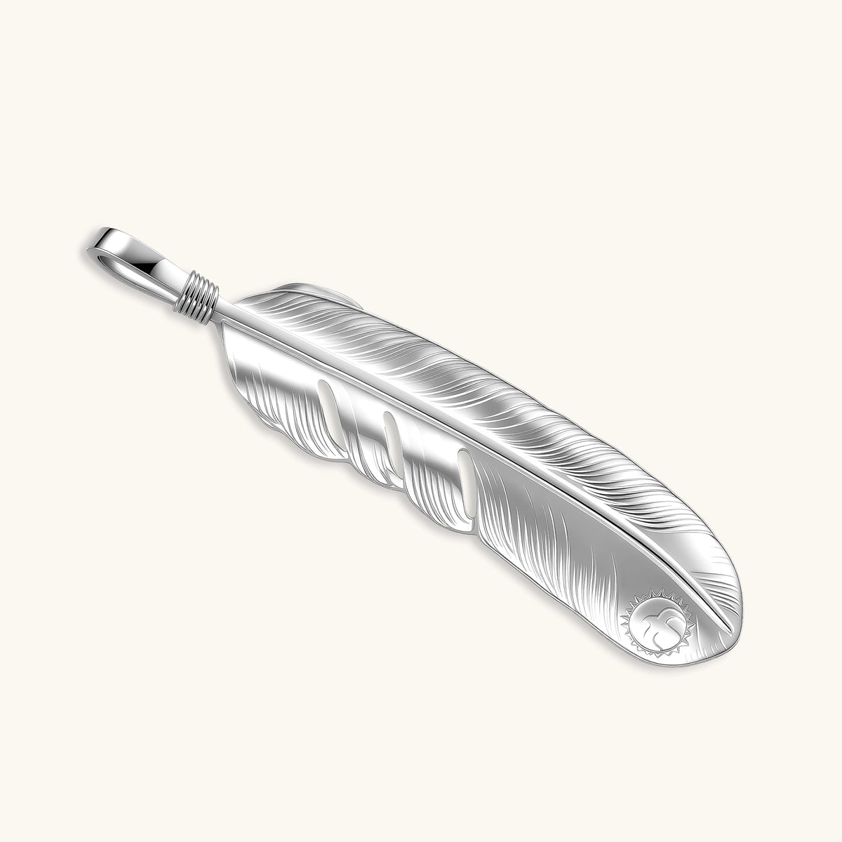 Sterling silver feather pendant with a gold-tone leaf accent and oval blue stone, shown on a box chain against a cream background.