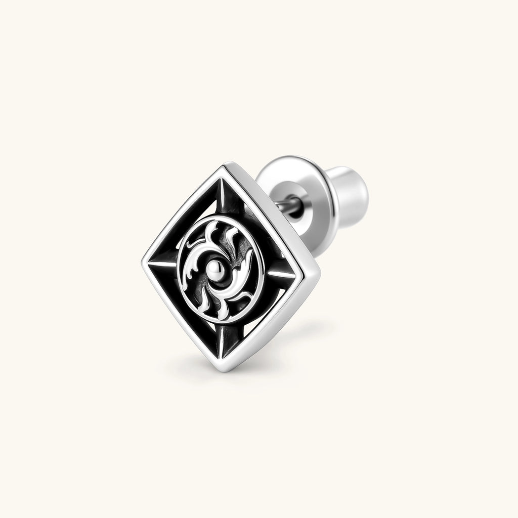 925 sterling silver square stud earring with oxidized black finish, swirling eye motif, and compass spike corners. 9.1mm.