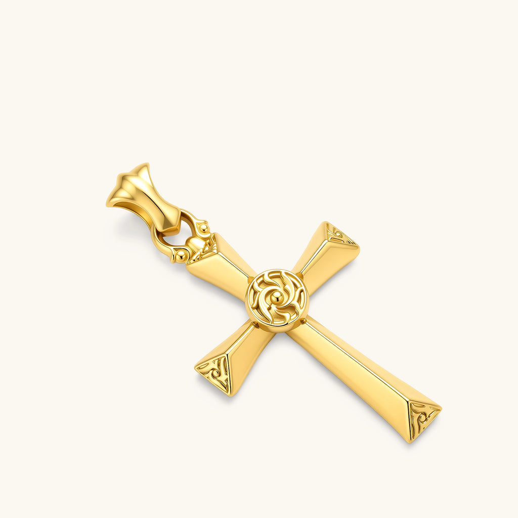 Gold cross pendant with rose motif center medallion, engraved tips, ornate bale, on a box chain. 58mm length.