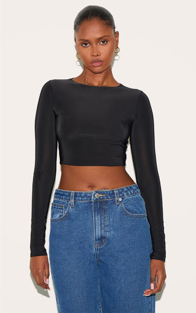 https://cdn-img.prettylittlething.com/3/c/b/b/3cbbbc5b1d21b6c5a766e425a77a6cef6a42c927_CNF0763_1_black_basic_slinky_long_sleeve_crop_top.jpg