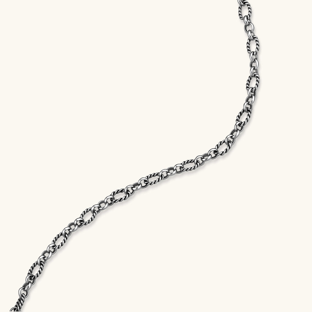 Oxidized 925 sterling silver necklace with alternating twisted oval and round links, lobster-claw clasp, 550mm length.