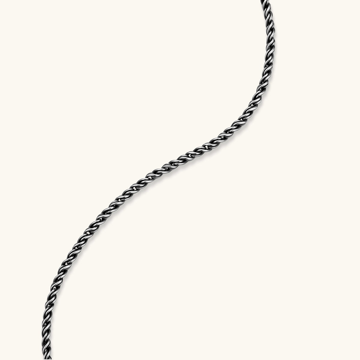 Oxidized 925 sterling silver rope chain necklace, 2.1mm width, carabiner clasp with brand stamp, on cream background.