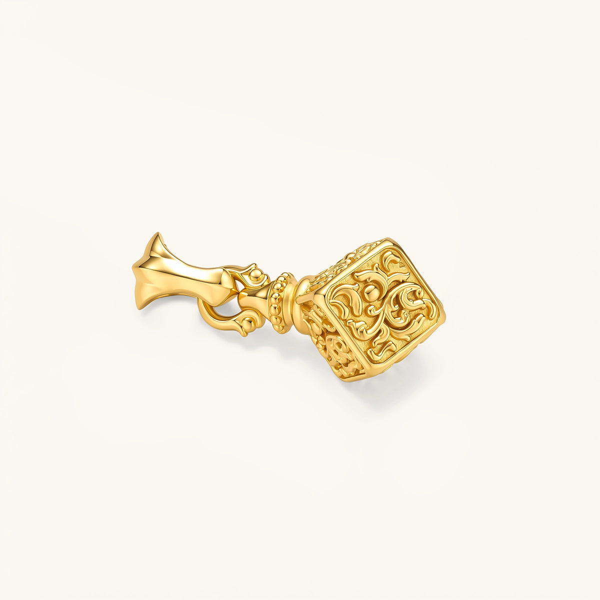 Gold 24K plated sterling silver hexagonal pendant with baroque scroll engravings on a box-link chain, 37mm length.