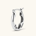 Polished 925 sterling silver quatrefoil hoop earrings with hinged snap closure and engraved hallmark, on cream background.