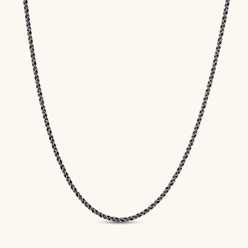 Oxidized 925 sterling silver rope chain necklace, 2.1mm width, carabiner clasp with brand stamp, on cream background.