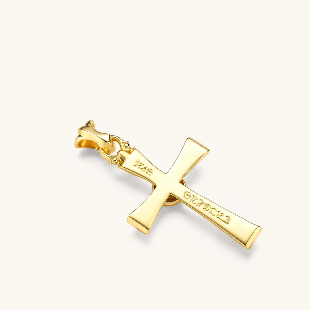 Gold cross pendant with rose motif center medallion, engraved tips, ornate bale, on a box chain. 58mm length.