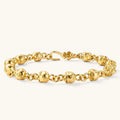 24K gold plated sterling silver bracelet with polished skull beads on a rolo chain link, hook-and-eye clasp, 200mm length.